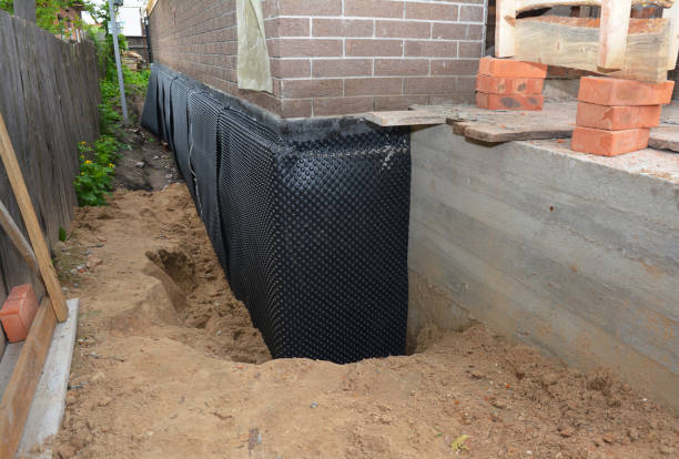 Happy homeowners after waterproofing job in Landisville